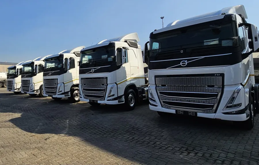Line of truck cabs parked side by side